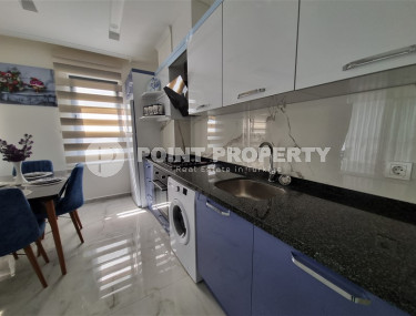 Stylish, two-room apartment with 1+1 layout, 75m2 in Alanya, in the popular Mahmutlar area.-id-1250-photo-3