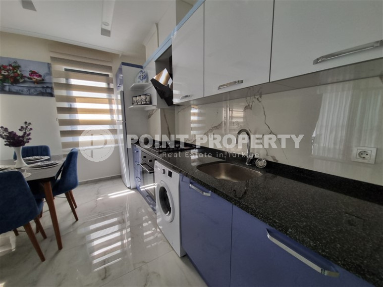 Stylish, two-room apartment with 1+1 layout, 75m2 in Alanya, in the popular Mahmutlar area.-id-1250-photo-3