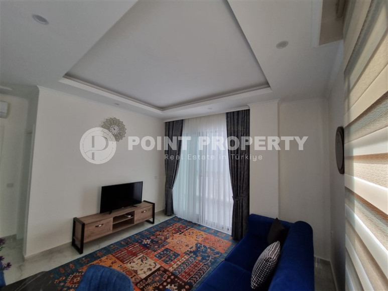 Stylish, two-room apartment with 1+1 layout, 75m2 in Alanya, in the popular Mahmutlar area.-id-1250-photo-5