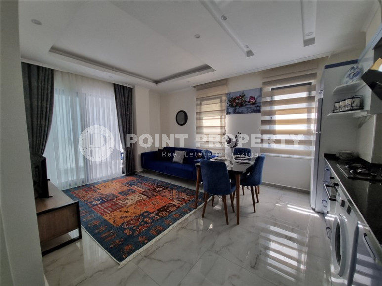 Stylish, two-room apartment with 1+1 layout, 75m2 in Alanya, in the popular Mahmutlar area.-id-1250-photo-6