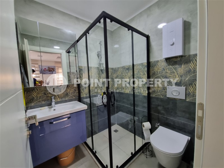 Stylish, two-room apartment with 1+1 layout, 75m2 in Alanya, in the popular Mahmutlar area.-id-1250-photo-8
