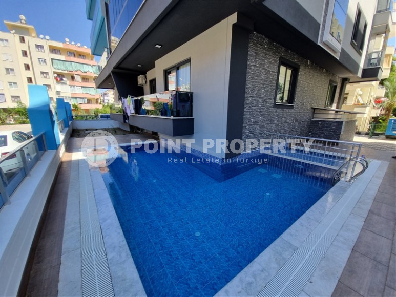 Stylish, two-room apartment with 1+1 layout, 75m2 in Alanya, in the popular Mahmutlar area.-id-1250-photo-14