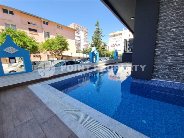 Stylish, two-room apartment with 1+1 layout, 75m2 in Alanya, in the popular Mahmutlar area.-id-1250-photo-15