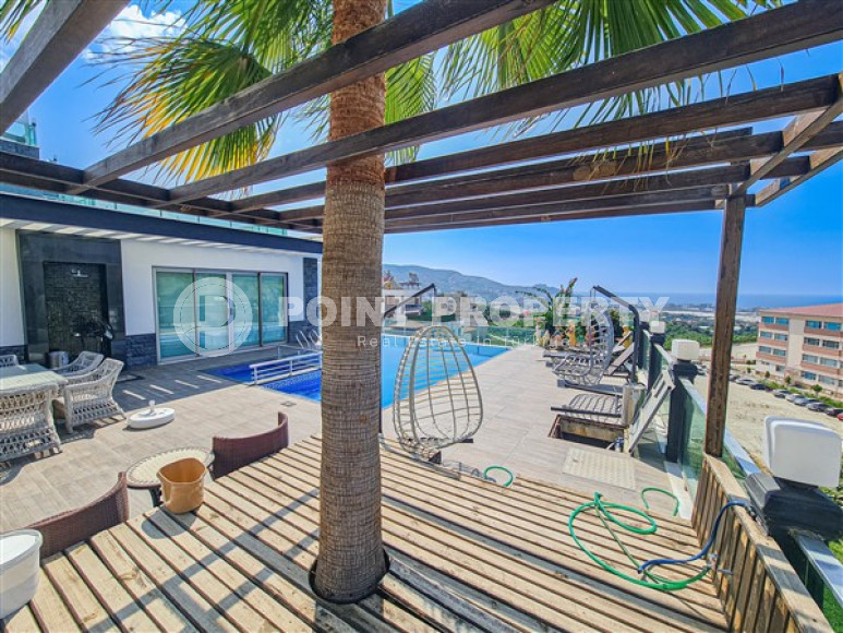 Элитная вилла 8+1 с роскошным дизайнерским интерьером, Каргыджак, Аланья, с участком земли 1400 м2-id-2821-фото-4