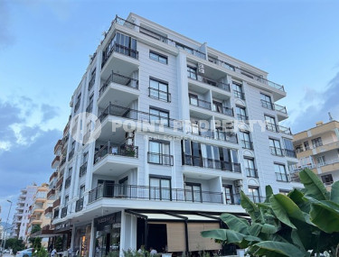 Respectable 2+1, in Mahmutlar, on the 4th floor of a house built in 2016, furnished, 250 meters from the sea-id-2823-photo-1