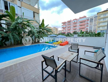 Respectable 2+1, in Mahmutlar, on the 4th floor of a house built in 2016, furnished, 250 meters from the sea-id-2823-photo-2