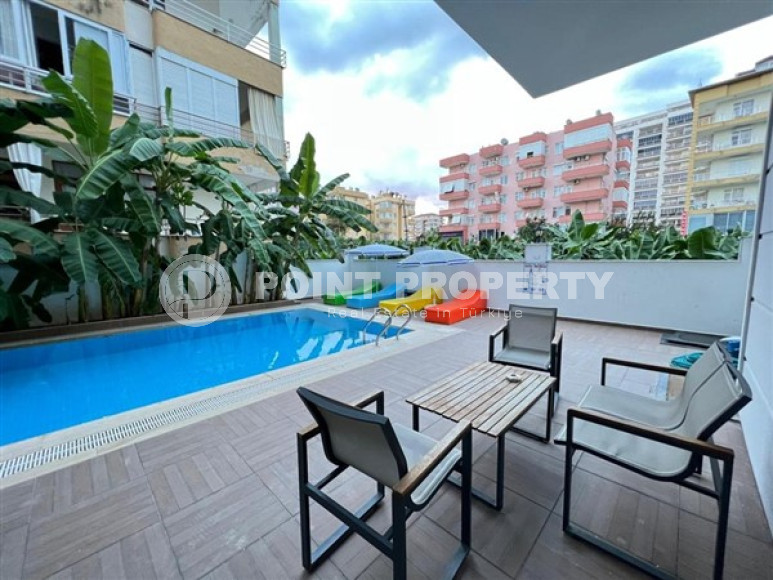 Respectable 2+1, in Mahmutlar, on the 4th floor of a house built in 2016, furnished, 250 meters from the sea-id-2823-photo-2