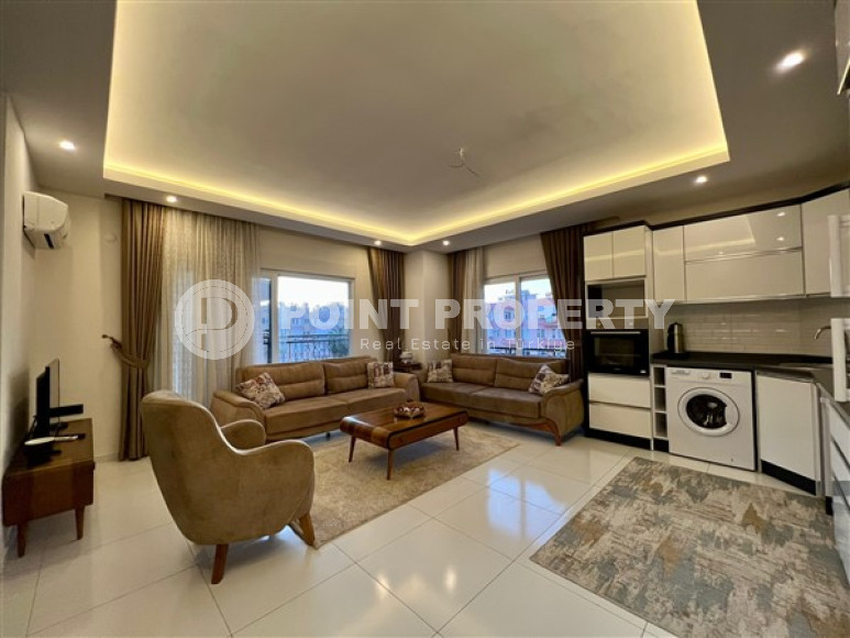 Respectable 2+1, in Mahmutlar, on the 4th floor of a house built in 2016, furnished, 250 meters from the sea-id-2823-photo-11