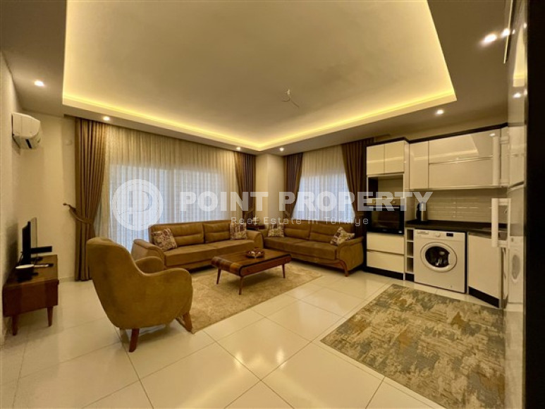 Respectable 2+1, in Mahmutlar, on the 4th floor of a house built in 2016, furnished, 250 meters from the sea-id-2823-photo-13