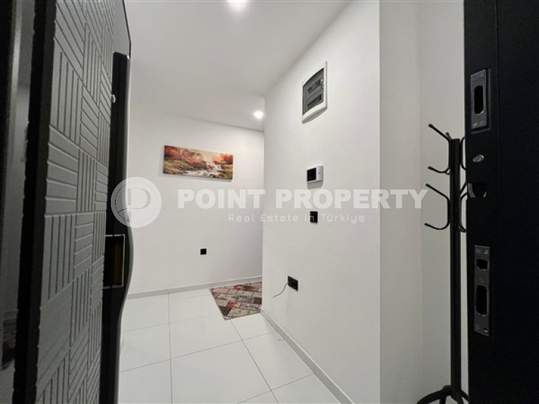 Respectable 2+1, in Mahmutlar, on the 4th floor of a house built in 2016, furnished, 250 meters from the sea-id-2823-photo-14