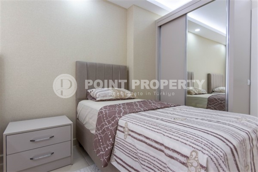 Lovely apartment with a 2+1 layout, in the international district of Mahmutlar, 500 meters from the embankment-id-2825-photo-25