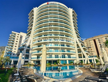 Views and fabulous two-room apartment 60 m2, in Mahmutlar, in a residence on the first line of the sea-id-2826-photo-1