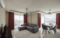 Stylish 1+1 apartment on the 8th floor of the residence, Mahmutlar, Alanya, with mountain views-id-2831-photo-1