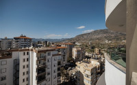 Stylish 1+1 apartment on the 8th floor of the residence, Mahmutlar, Alanya, with mountain views-id-2831-photo-3