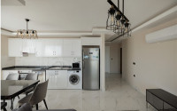 Stylish 1+1 apartment on the 8th floor of the residence, Mahmutlar, Alanya, with mountain views-id-2831-photo-6