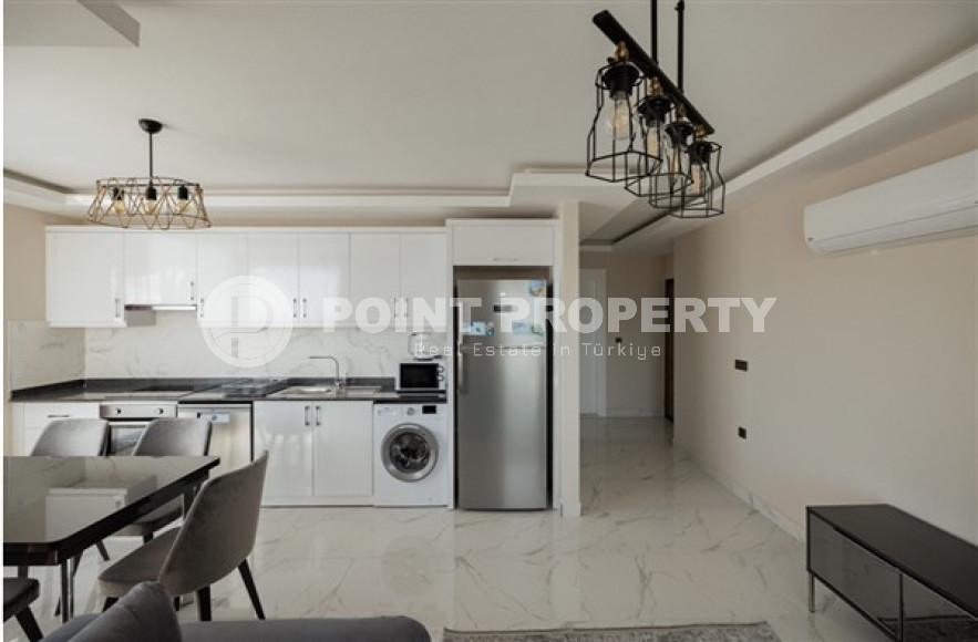 Stylish 1+1 apartment on the 8th floor of the residence, Mahmutlar, Alanya, with mountain views-id-2831-photo-6