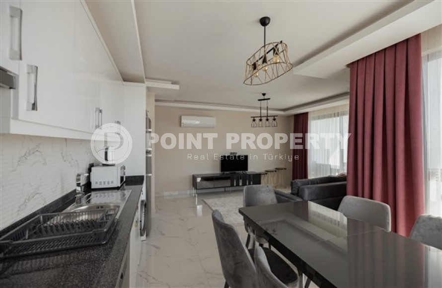 Stylish 1+1 apartment on the 8th floor of the residence, Mahmutlar, Alanya, with mountain views-id-2831-photo-8