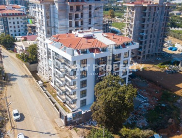 Inexpensive two-room apartment with an area of 55m2, in the Mahmutlar area, with a balcony and unfurnished-id-2837-photo-2