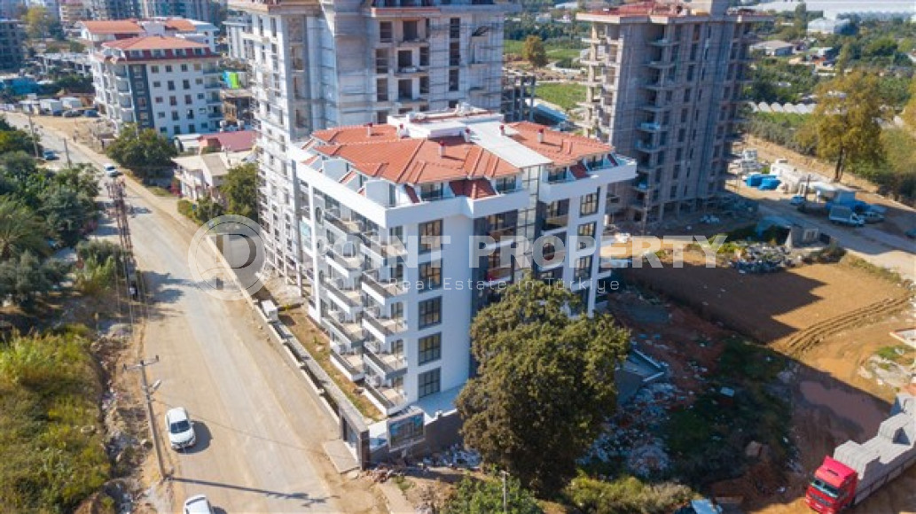 Inexpensive two-room apartment with an area of 55m2, in the Mahmutlar area, with a balcony and unfurnished-id-2837-photo-2