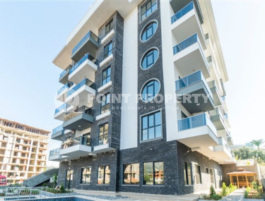 Inexpensive two-room apartment with an area of 55m2, in the Mahmutlar area, with a balcony and unfurnished-id-2837-photo-3