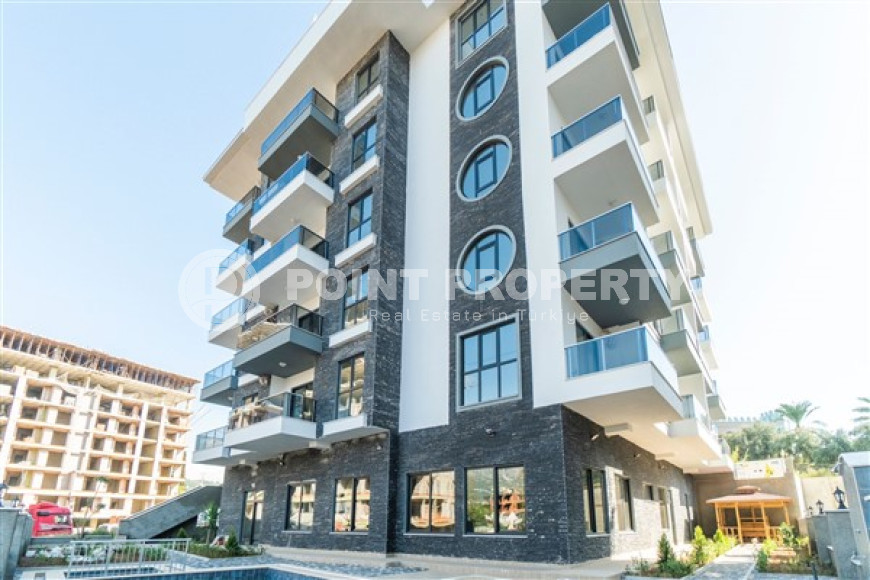 Inexpensive two-room apartment with an area of 55m2, in the Mahmutlar area, with a balcony and unfurnished-id-2837-photo-3