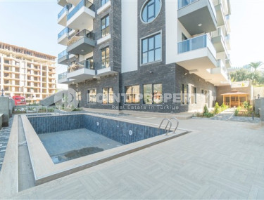 Inexpensive two-room apartment with an area of 55m2, in the Mahmutlar area, with a balcony and unfurnished-id-2837-photo-4