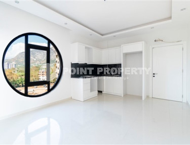 Inexpensive two-room apartment with an area of 55m2, in the Mahmutlar area, with a balcony and unfurnished-id-2837-photo-5