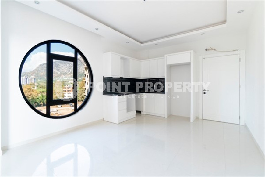 Inexpensive two-room apartment with an area of 55m2, in the Mahmutlar area, with a balcony and unfurnished-id-2837-photo-5