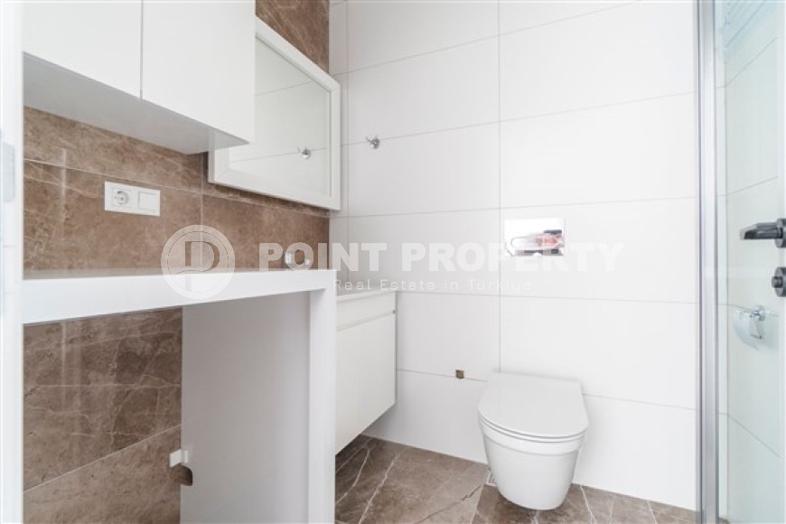 Inexpensive two-room apartment with an area of 55m2, in the Mahmutlar area, with a balcony and unfurnished-id-2837-photo-7