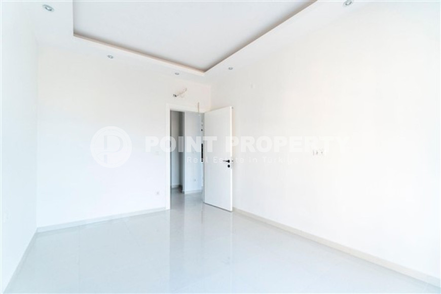 Inexpensive two-room apartment with an area of 55m2, in the Mahmutlar area, with a balcony and unfurnished-id-2837-photo-9