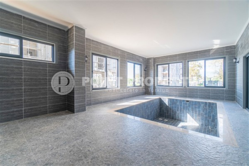 Inexpensive two-room apartment with an area of 55m2, in the Mahmutlar area, with a balcony and unfurnished-id-2837-photo-11