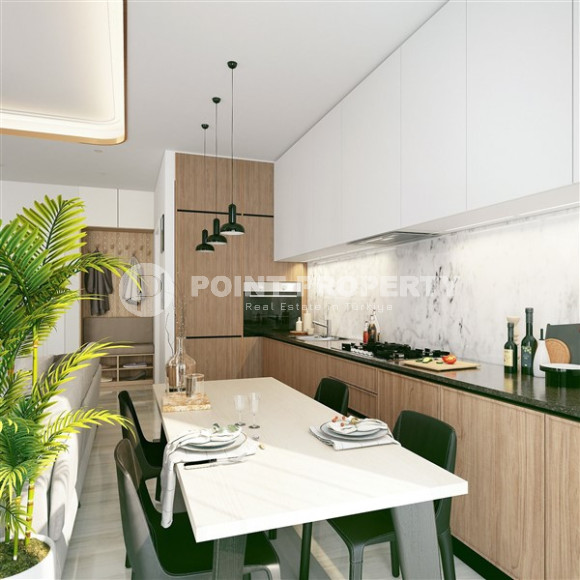 One-room apartment in a premium class residence under construction in the Mahmutlar area, 59 m2.-id-1254-photo-3