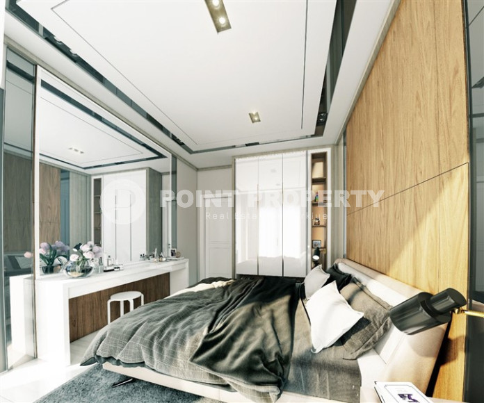 One-room apartment in a premium class residence under construction in the Mahmutlar area, 59 m2.-id-1254-photo-4