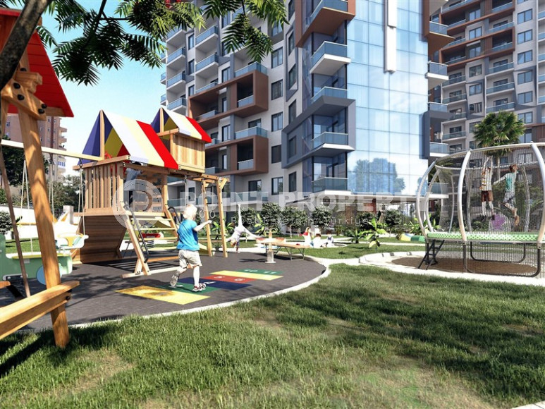 One-room apartment in a premium class residence under construction in the Mahmutlar area, 59 m2.-id-1254-photo-5