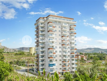 Nice apartment 65 m2 on the 6th floor of a building with infrastructure, Mahmutlar, Alanya-id-2864-photo-1