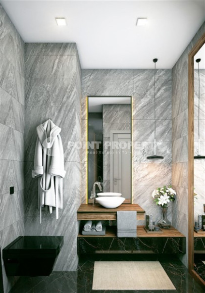 One-room apartment in a premium class residence under construction in the Mahmutlar area, 59 m2.-id-1254-photo-11