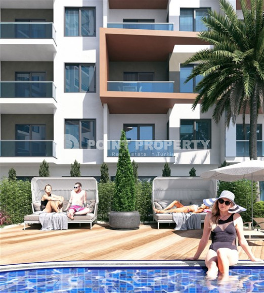 One-room apartment in a premium class residence under construction in the Mahmutlar area, 59 m2.-id-1254-photo-13