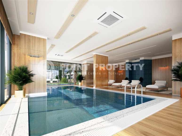 One-room apartment in a premium class residence under construction in the Mahmutlar area, 59 m2.-id-1254-photo-33