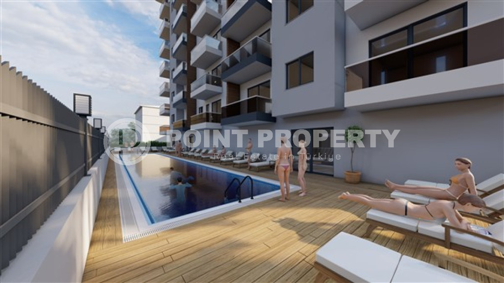 Apartments in various price categories 48 - 109 m2 in a high-rise complex under construction with hotel infrastructure in the Avsallar area, Alanya-id-2876-photo-22