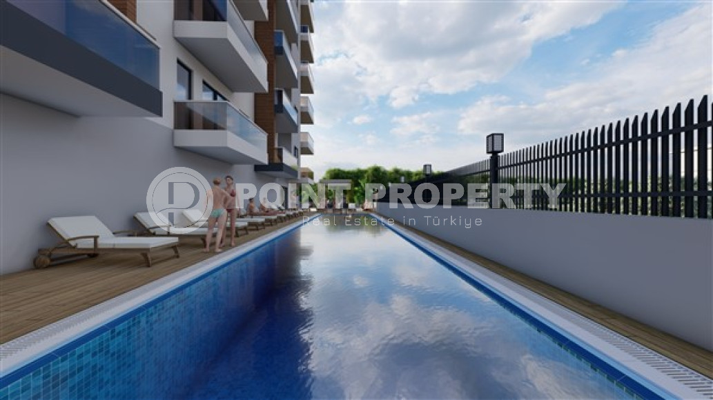 Apartments in various price categories 48 - 109 m2 in a high-rise complex under construction with hotel infrastructure in the Avsallar area, Alanya-id-2876-photo-23