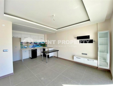 Стандартная по площади квартира 1+1 в районе Оба, в новом комплексе 2022 года-id-2877-фото-5