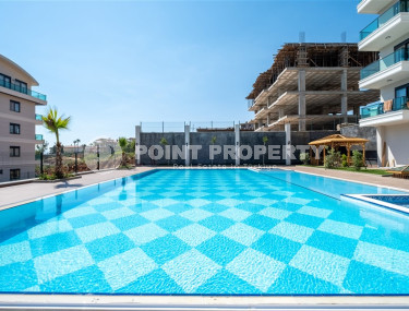 Furnished two-room apartment with an area of 47 m2. Oba district.-id-1255-photo-3