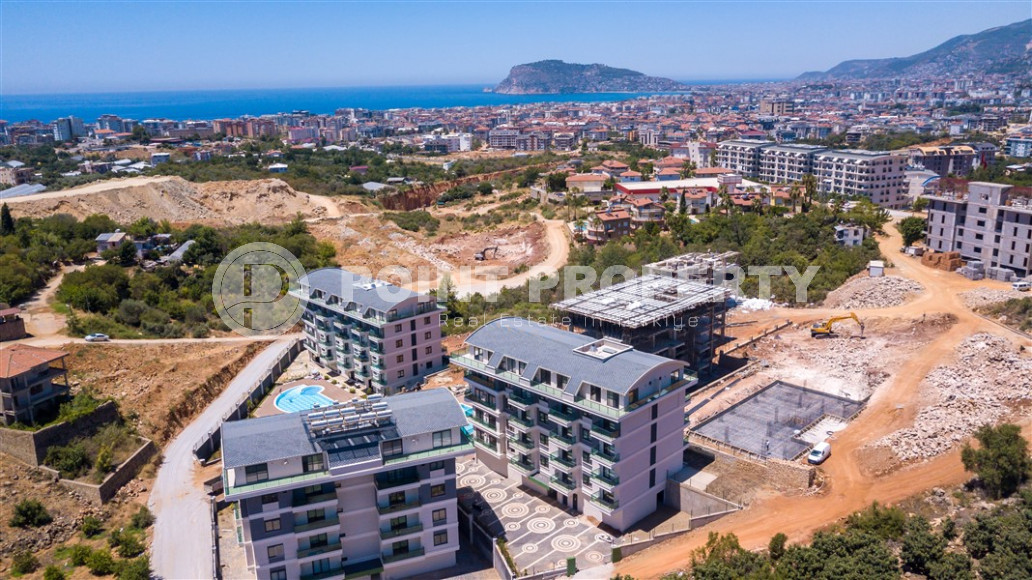 Furnished two-room apartment with an area of 47 m2. Oba district.-id-1255-photo-6