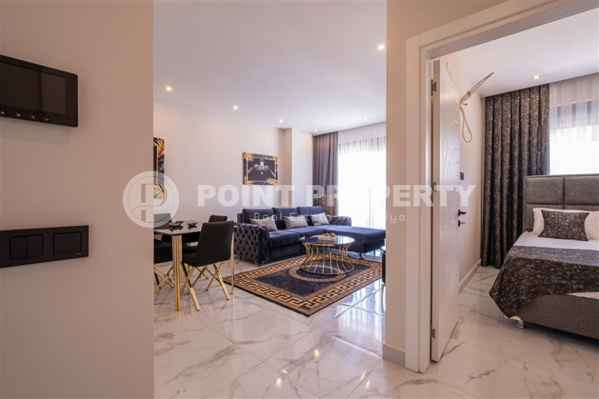 Furnished two-room apartment with an area of 47 m2. Oba district.-id-1255-photo-17