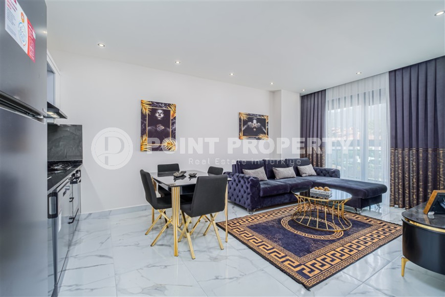 Furnished two-room apartment with an area of 47 m2. Oba district.-id-1255-photo-18