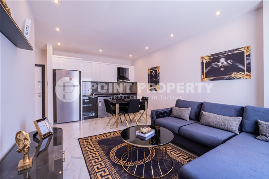 Furnished two-room apartment with an area of 47 m2. Oba district.-id-1255-photo-19