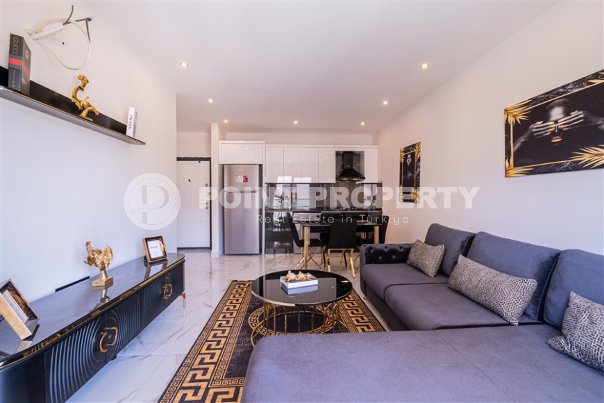 Furnished two-room apartment with an area of 47 m2. Oba district.-id-1255-photo-20