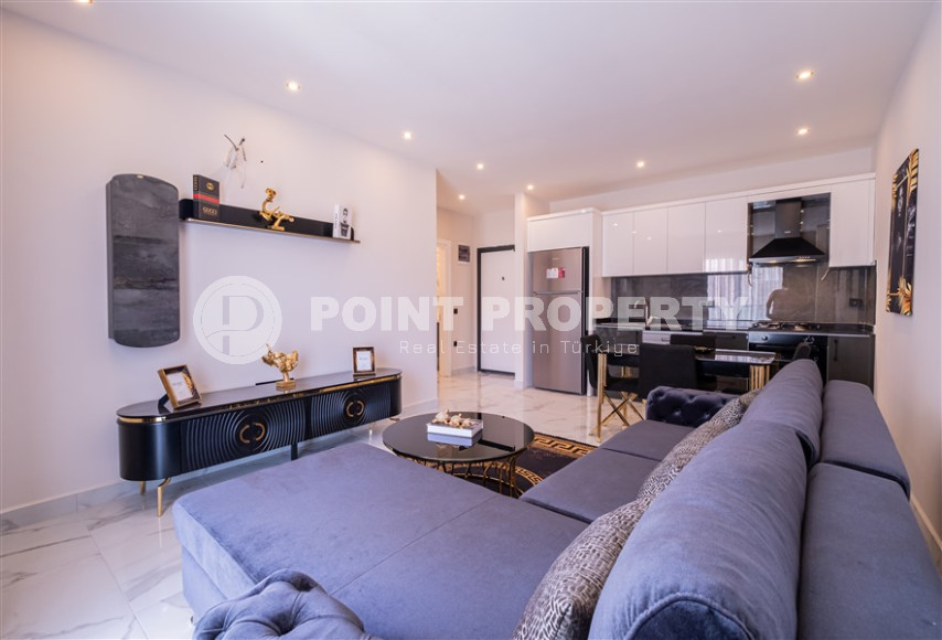 Furnished two-room apartment with an area of 47 m2. Oba district.-id-1255-photo-21