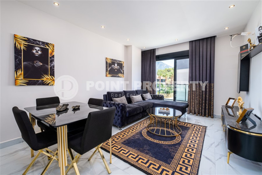 Furnished two-room apartment with an area of 47 m2. Oba district.-id-1255-photo-22