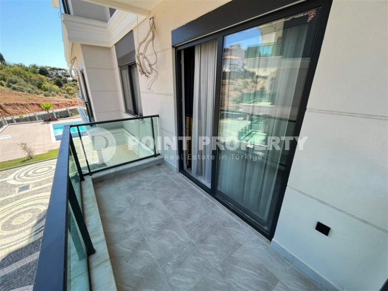 Furnished two-room apartment with an area of 47 m2. Oba district.-id-1255-photo-23